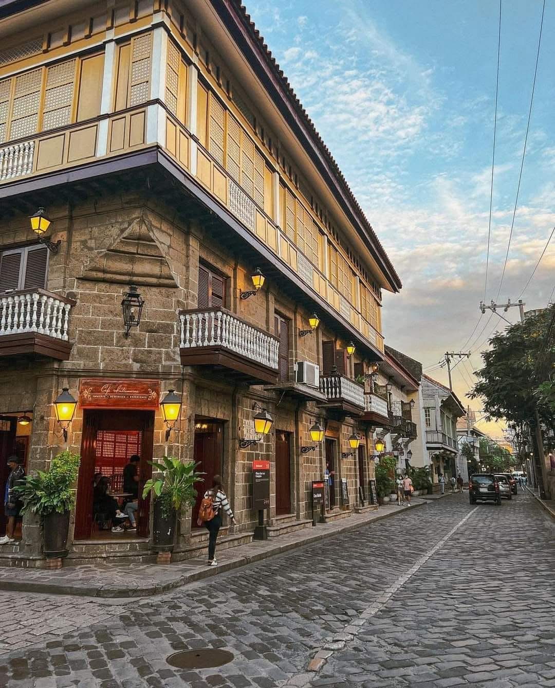Reference photograph of a cobblestone street in Intramuros, Manila